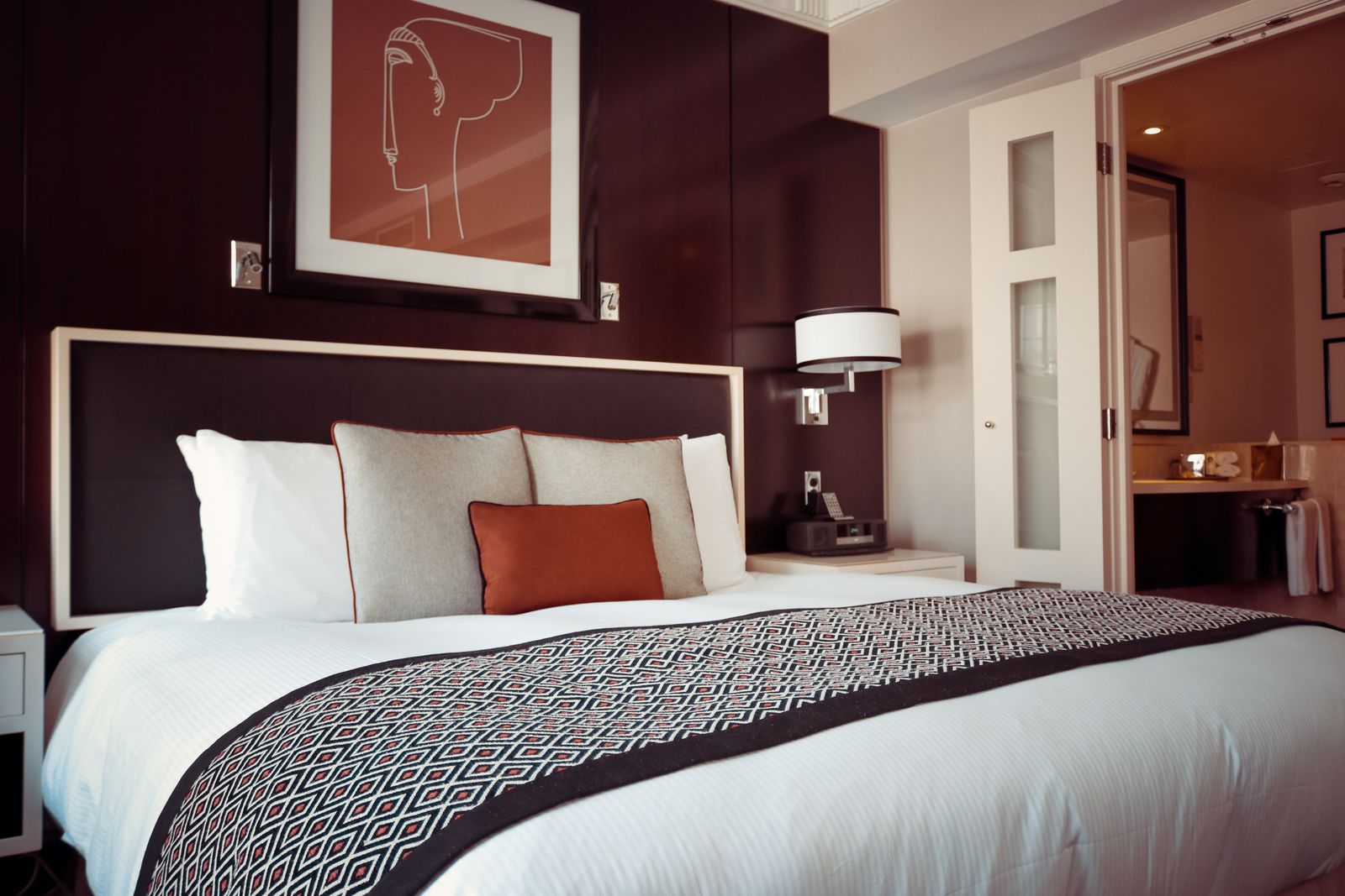 Luxury hotel suite with floor-to-ceiling windows overlooking the Nile
